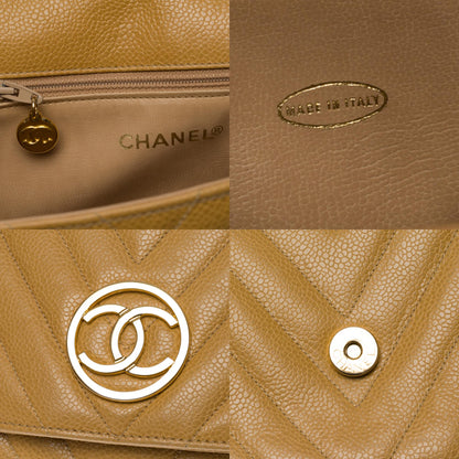 CHANEL Classic Flap shoulder bag in gold herringbone caviar leather, GHW