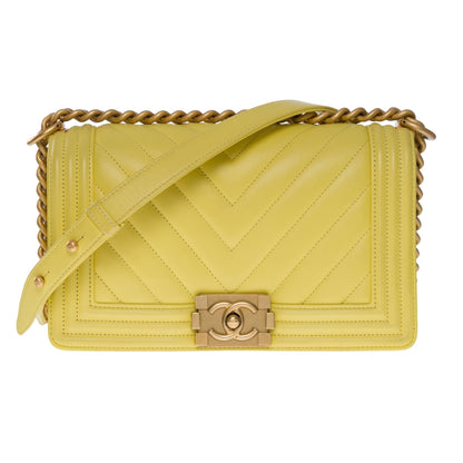 CHANEL Boy Old Medium shoulder bag in Yellow quilted herringbone leather, MGHW