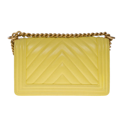 CHANEL Boy Old Medium shoulder bag in Yellow quilted herringbone leather, MGHW