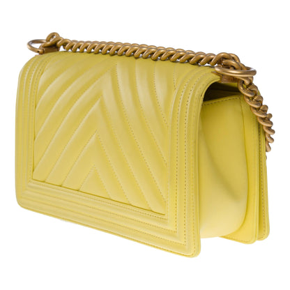 CHANEL Boy Old Medium shoulder bag in Yellow quilted herringbone leather, MGHW