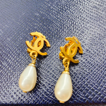 Chanel double C logo and pearl Earrings