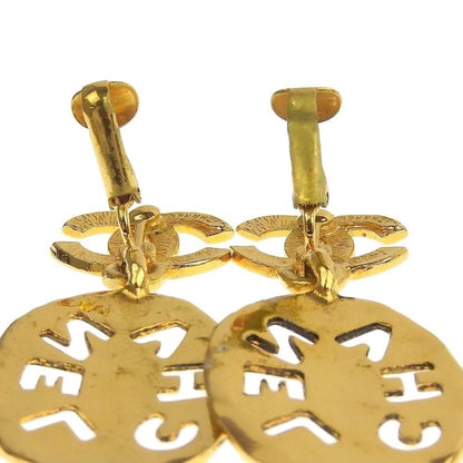 Chanel earrings here mark gold logo vintage