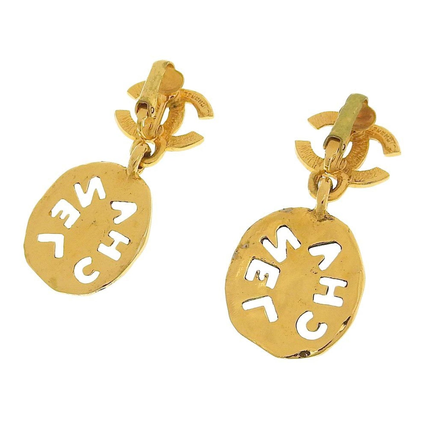 Chanel earrings here mark gold logo vintage