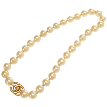 Chanel Coco Mark Turnlock Pearl Necklace Fake Gold Hardware Accessories Vintage