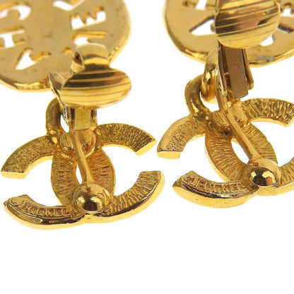 Chanel earrings here mark gold logo vintage