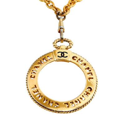 CHANEL coco mark round loupe necklace gold plated glass ladies