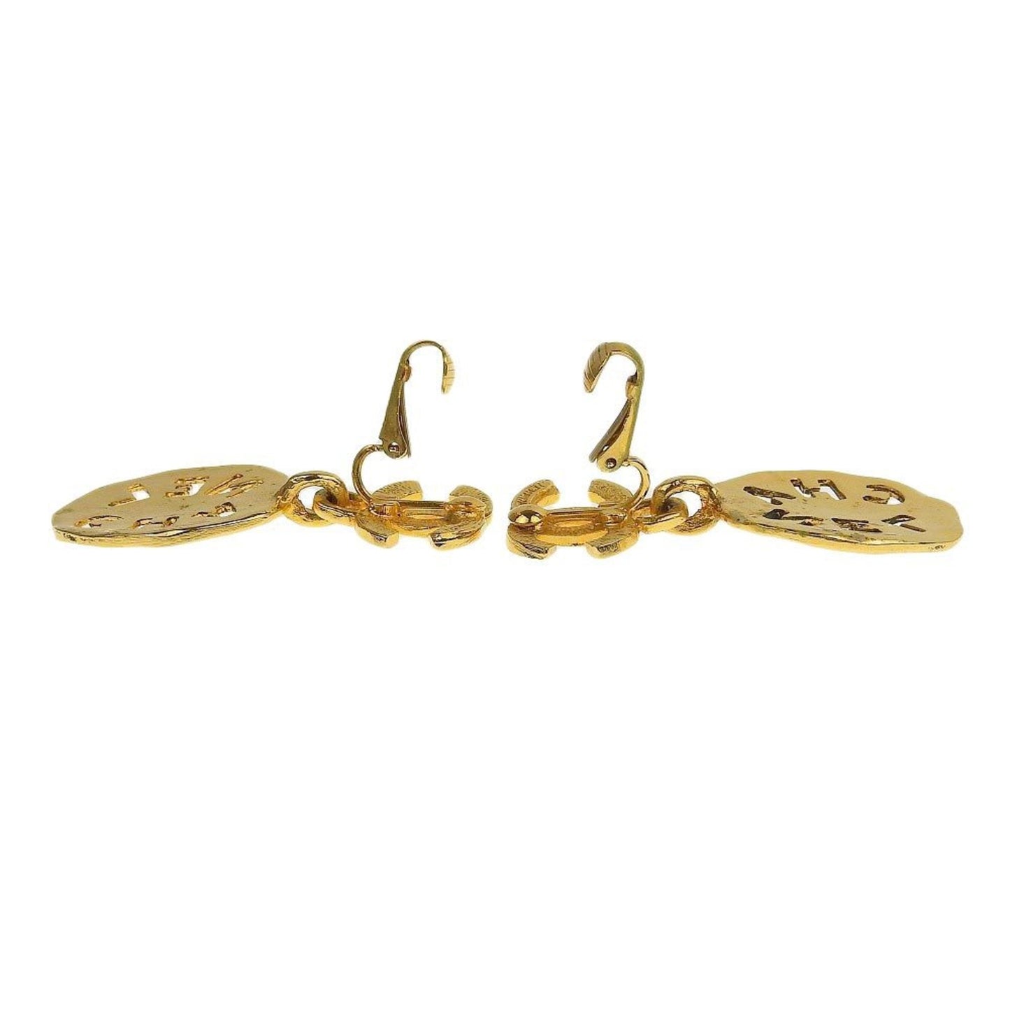 Chanel earrings here mark gold logo vintage