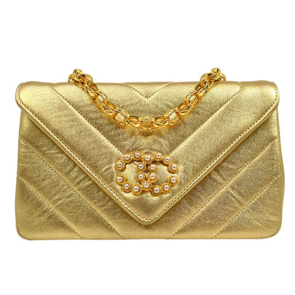 CHANEL 1991-1994 Gold Lambskin Chevron Faux Pearl CC Flap Bag 21672