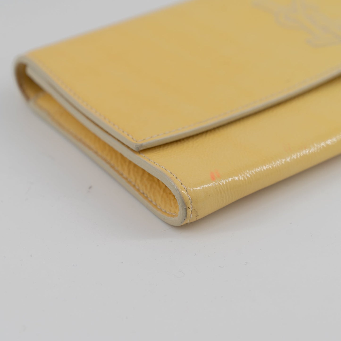 Yves Saint Laurent yellow leather clutch TWS pop