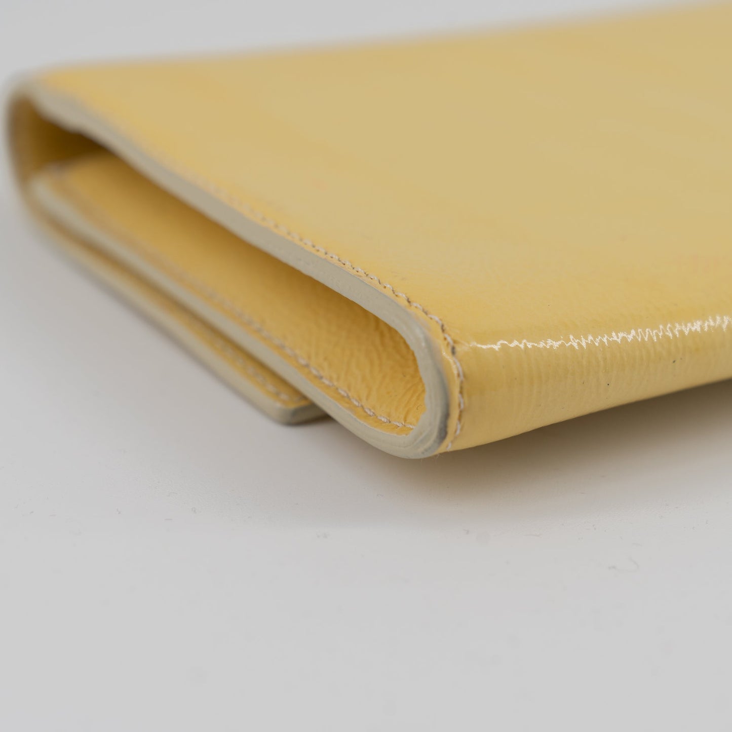 Yves Saint Laurent yellow leather clutch TWS pop