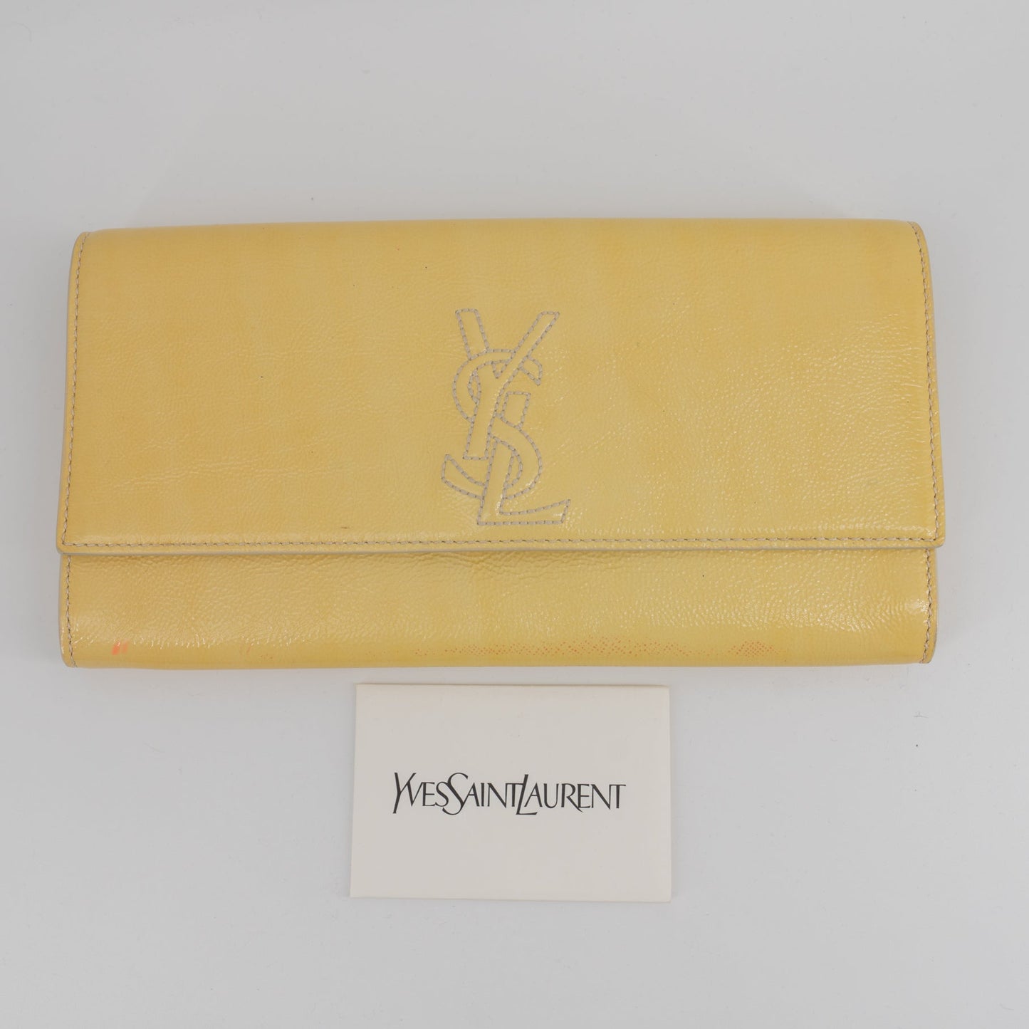 Yves Saint Laurent yellow leather clutch TWS pop