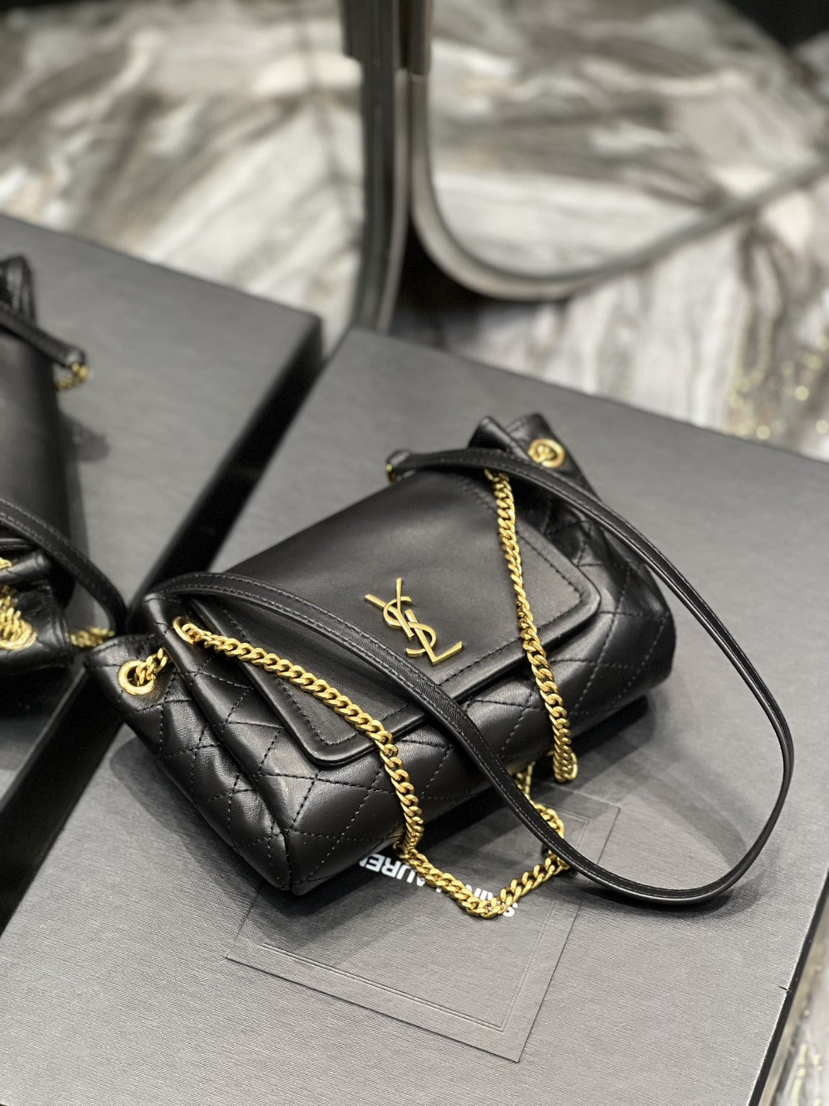 Yves Saint Laurent Mini Nolita In original Lambskin Bag