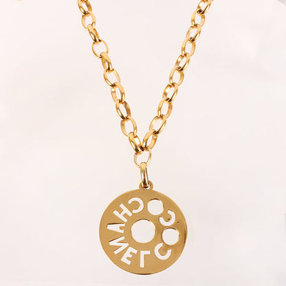 CHANEL Round Cutout Logo Plate Necklace