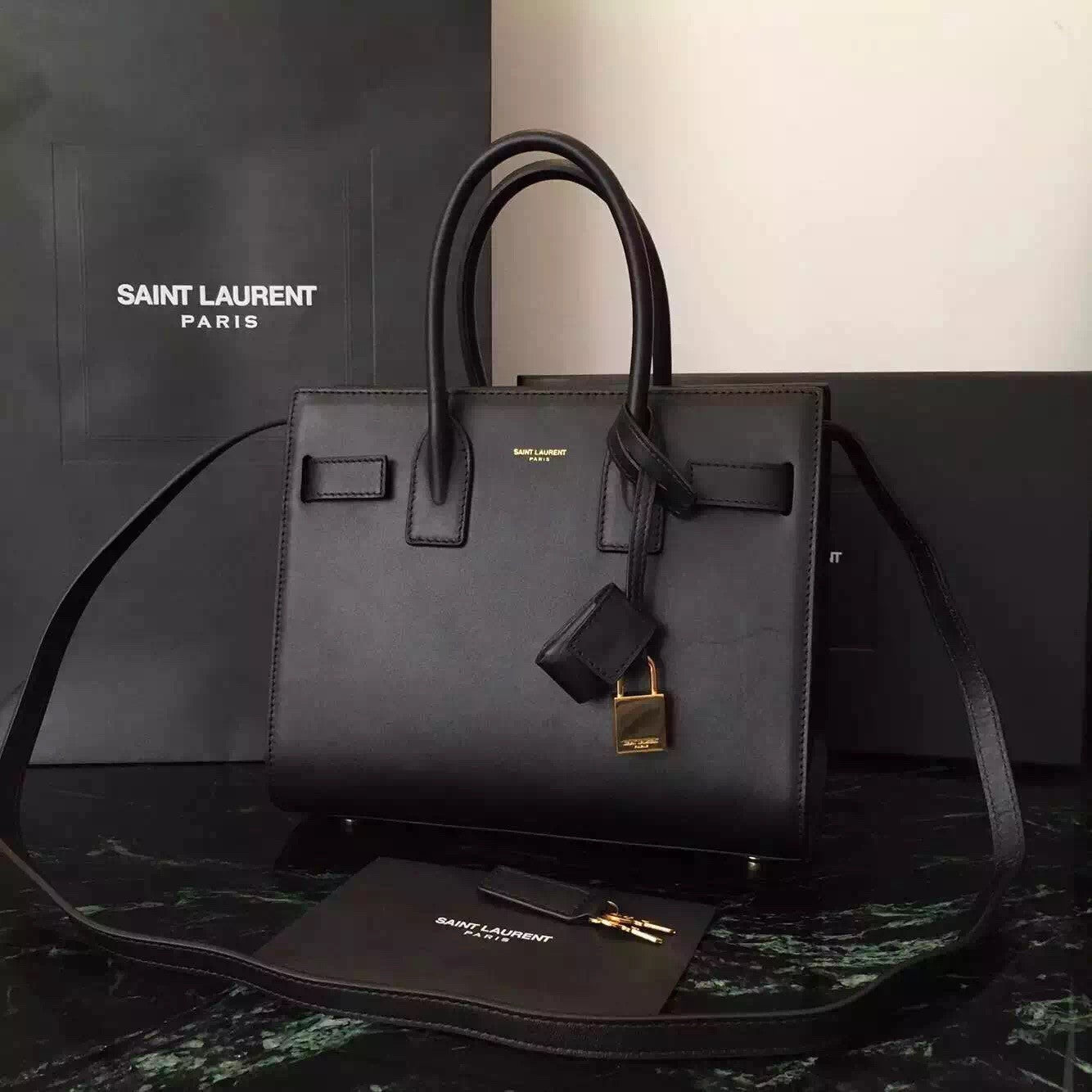 Yves Saint Laurent Baby Sac De Jour Bag In Black Leather