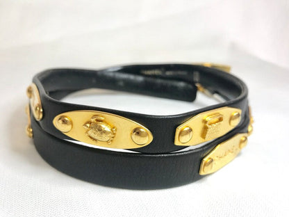 CHANEL Vintage black belt with golden buckle and iconic logo motifs, CC mark, camellia flower, turtle, perfume, clover