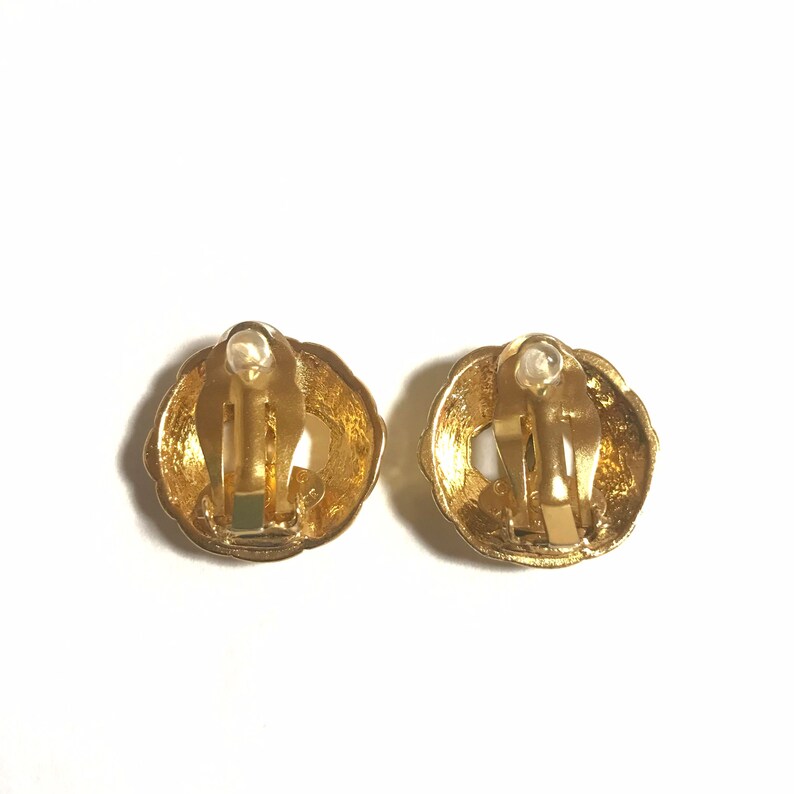 CHANEL Vintage gold tone round earrings with CC mark