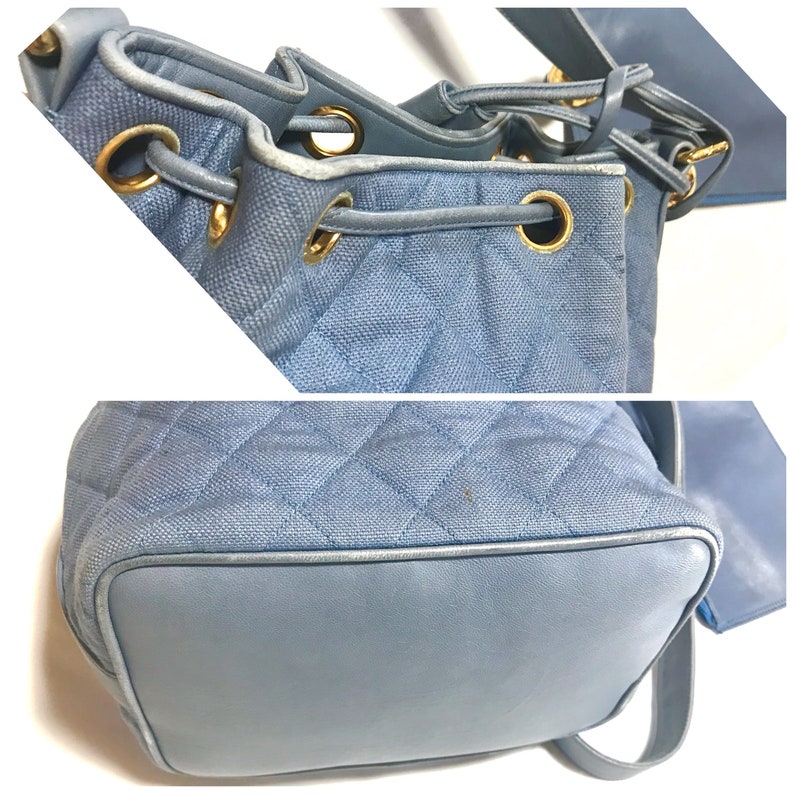 CHANEL Vintage blue quilted canvas and leather combo hobo bucket shoulder bag with drawstrings and golden CC mark balls