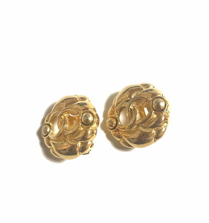 CHANEL Vintage gold tone round earrings with CC mark