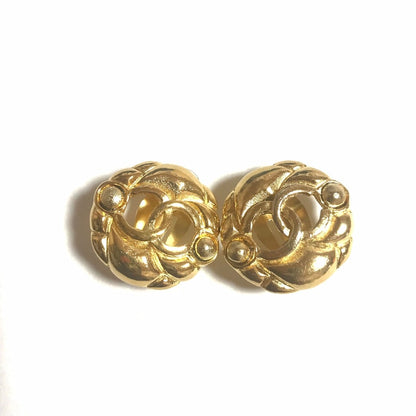 CHANEL Vintage gold tone round earrings with CC mark