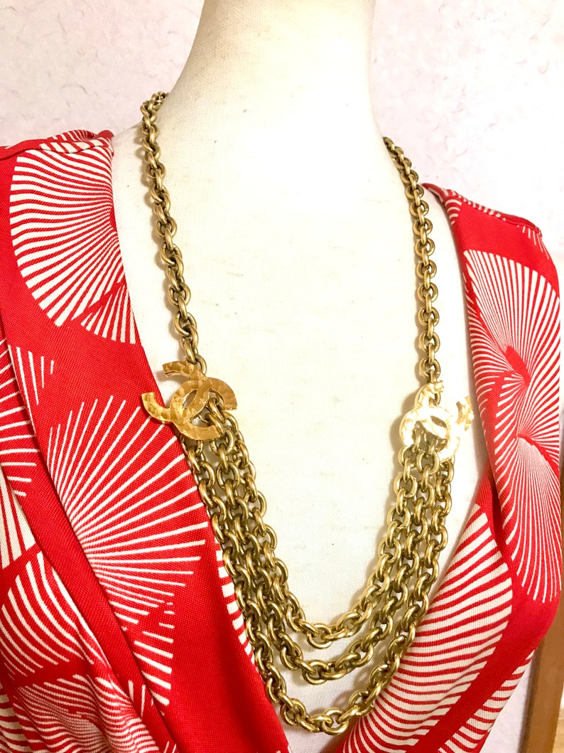 CHANEL Vintage gold chain belt with triple layer chains and two large CC mark charms at sides