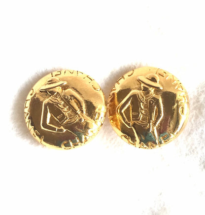 CHANEL Vintage gold tone round earrings with mademoiselle figure