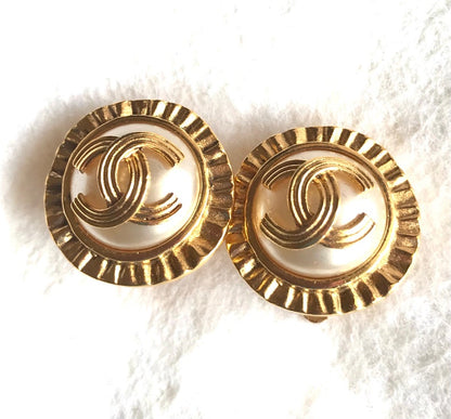 CHANEL Vintage golden round earrings with sun and CC mark motif faux pearl