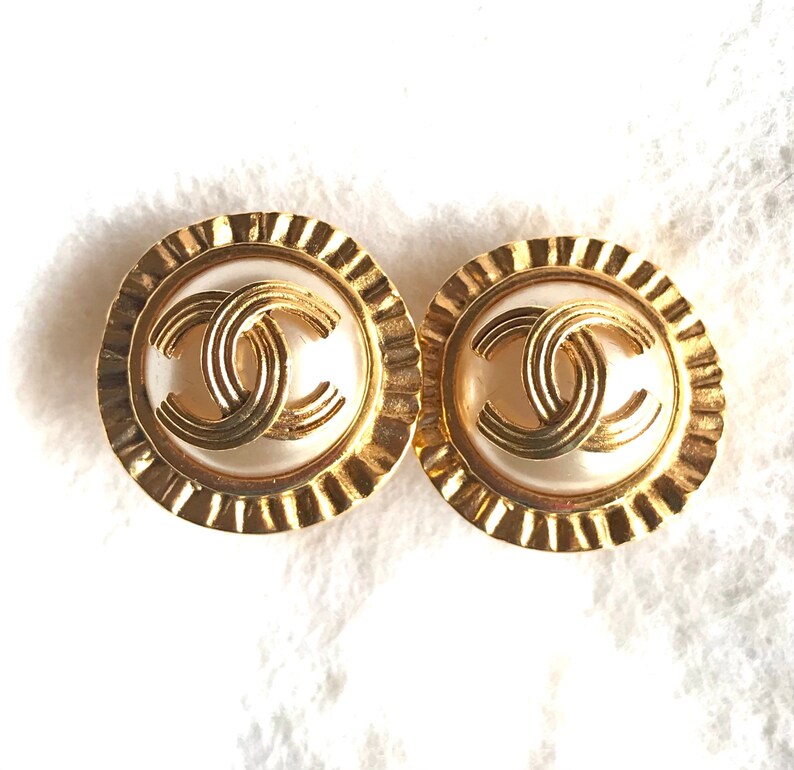 CHANEL Vintage golden round earrings with sun and CC mark motif faux pearl