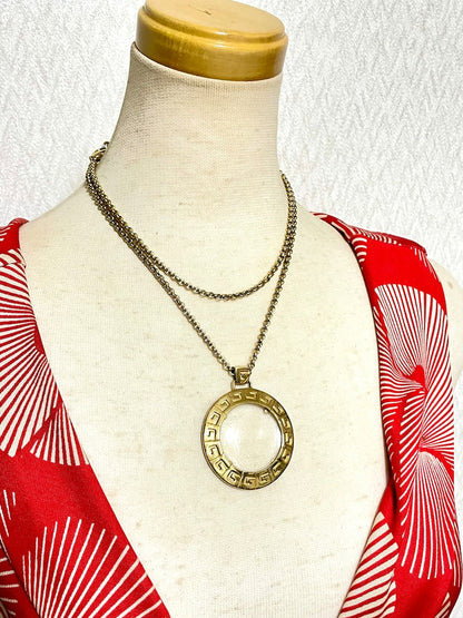 GIVENCHY Vintage golden chain necklace with round loupe top