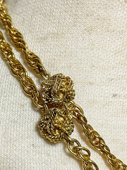 CHANEL Vintage golden chain necklace with loupe glass pendant top and ball charms