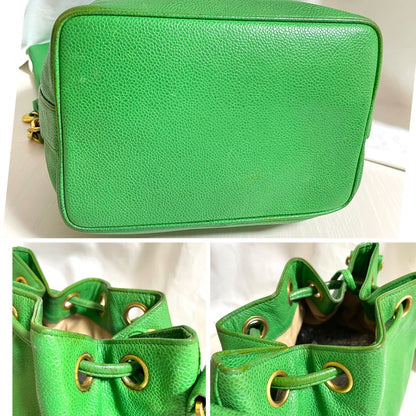 CHANEL Vintage green caviar leather hobo bucket shoulder bag with golden chain strap, drawstrings, and CC stitch mark