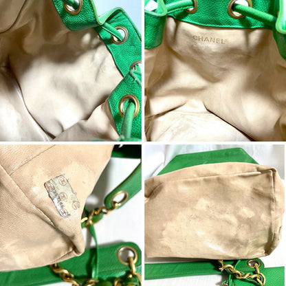 CHANEL Vintage green caviar leather hobo bucket shoulder bag with golden chain strap, drawstrings, and CC stitch mark