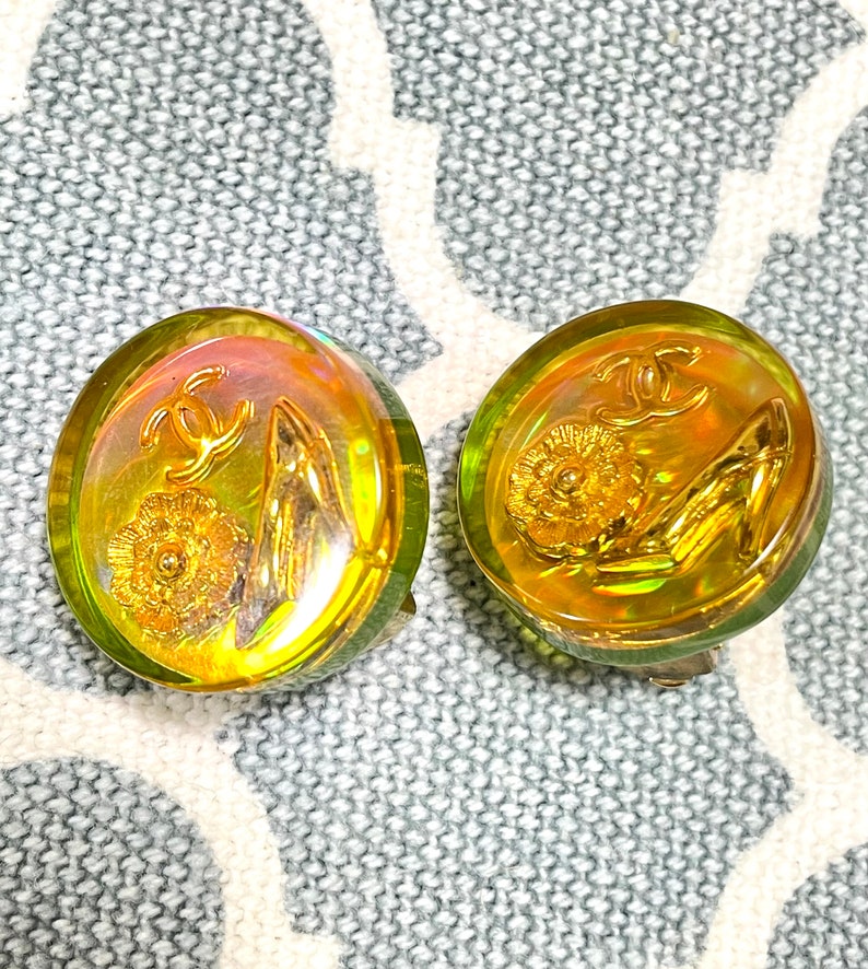 CHANEL Vintage yellow orange tone aurora resin earrings with iconic charms