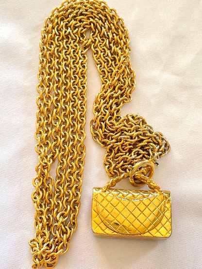 CHANEL Vintage golden triple chain long necklace with classic 2