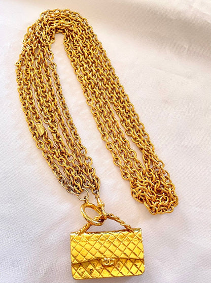 CHANEL Vintage golden triple chain long necklace with classic 2