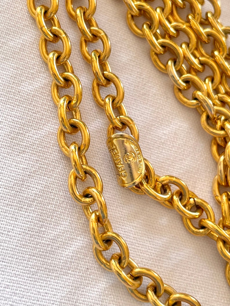 CHANEL Vintage golden triple chain long necklace with classic 2