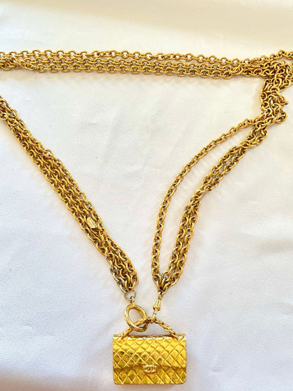 CHANEL Vintage golden triple chain long necklace with classic 2