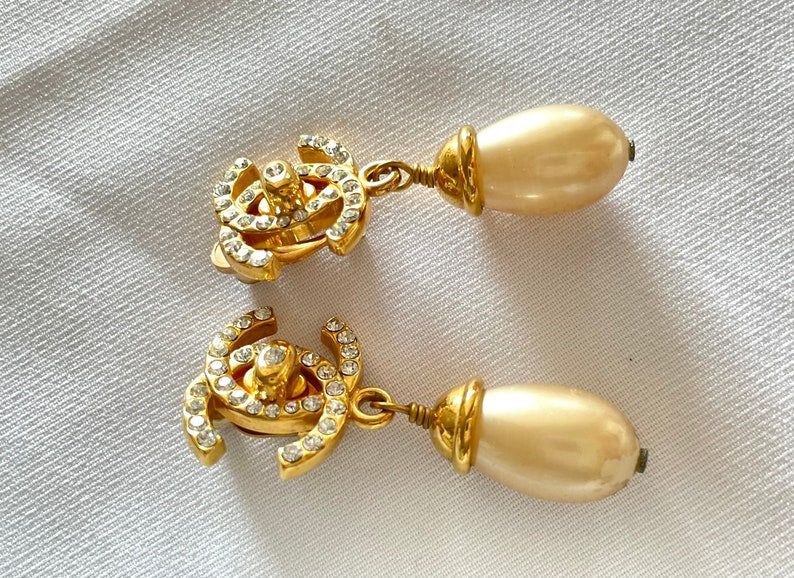 CHANEL Vintage teardrop turn-lock crystal CC and dangle pearl earrings