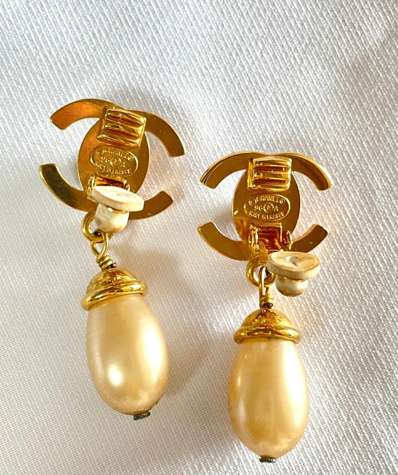 CHANEL Vintage teardrop turn-lock crystal CC and dangle pearl earrings