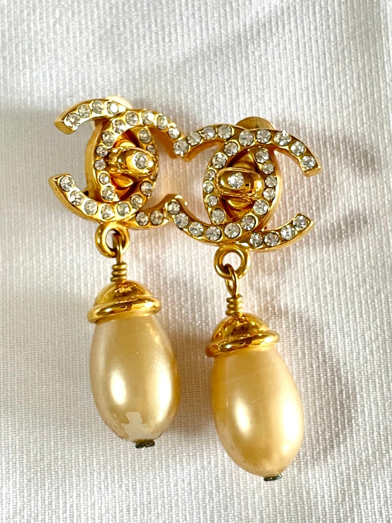 CHANEL Vintage teardrop turn-lock crystal CC and dangle pearl earrings