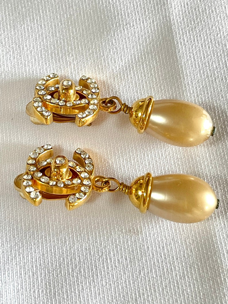 CHANEL Vintage teardrop turn-lock crystal CC and dangle pearl earrings