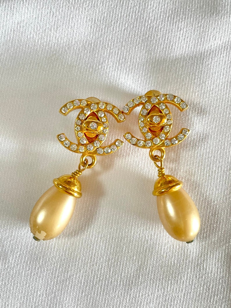 CHANEL Vintage teardrop turn-lock crystal CC and dangle pearl earrings