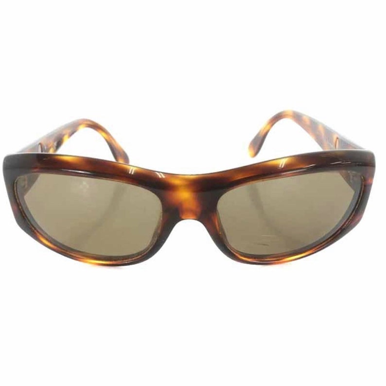 CHANEL Vintage brown frame and grey shade sunglasses with golden CC motifs at sides