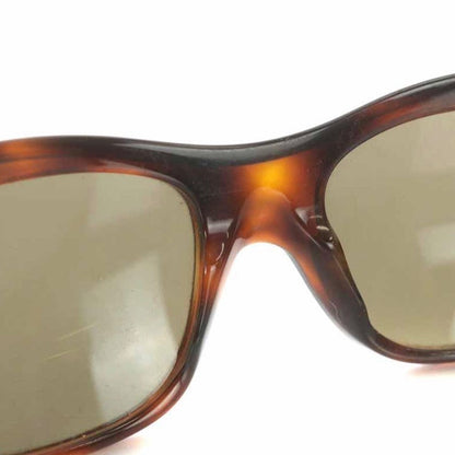 CHANEL Vintage brown frame and grey shade sunglasses with golden CC motifs at sides