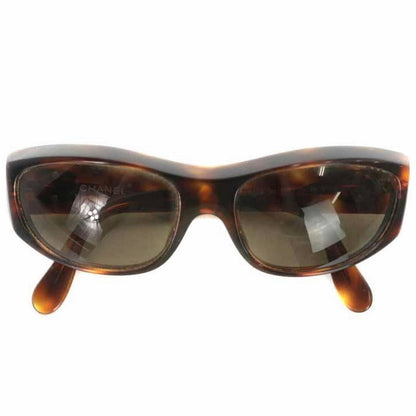 CHANEL Vintage brown frame and grey shade sunglasses with golden CC motifs at sides