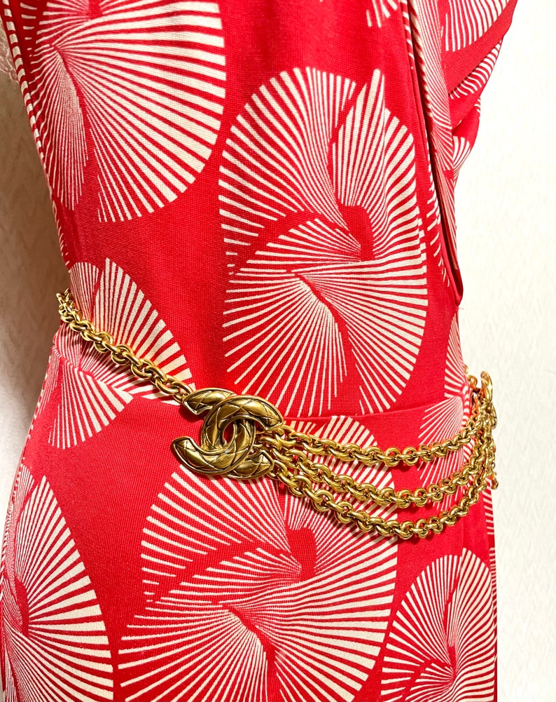 CHANEL Vintage gold chain belt with triple layer chains and two large matelasse CC mark charms at sides