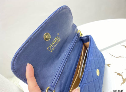 Blue suede Chanel woman handbag