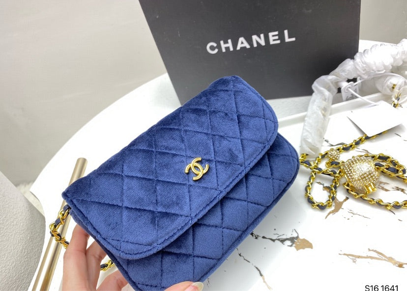 Blue suede Chanel woman handbag