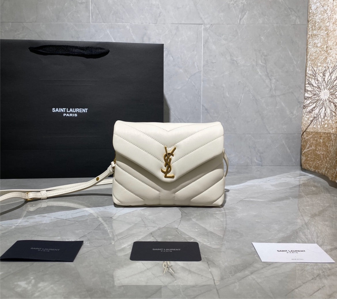 Woman Yves Saint Laurent handbag