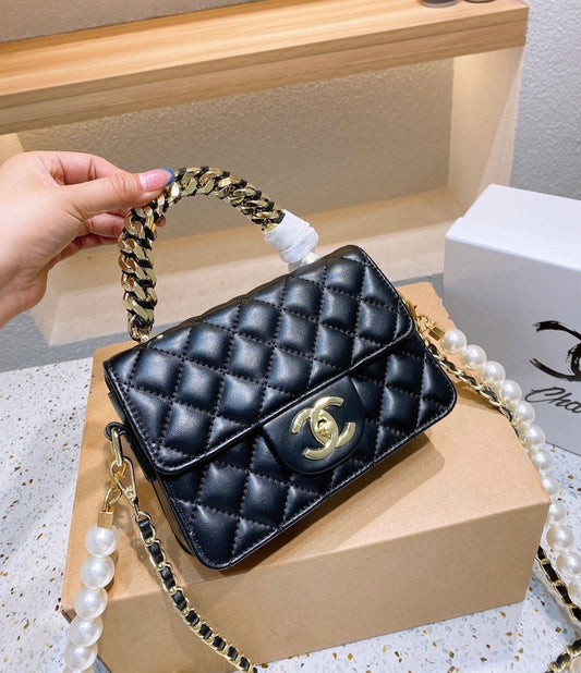 Black leather Chanel handbag