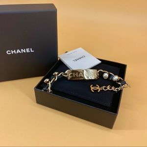 CHANEL metal & leather bracelet